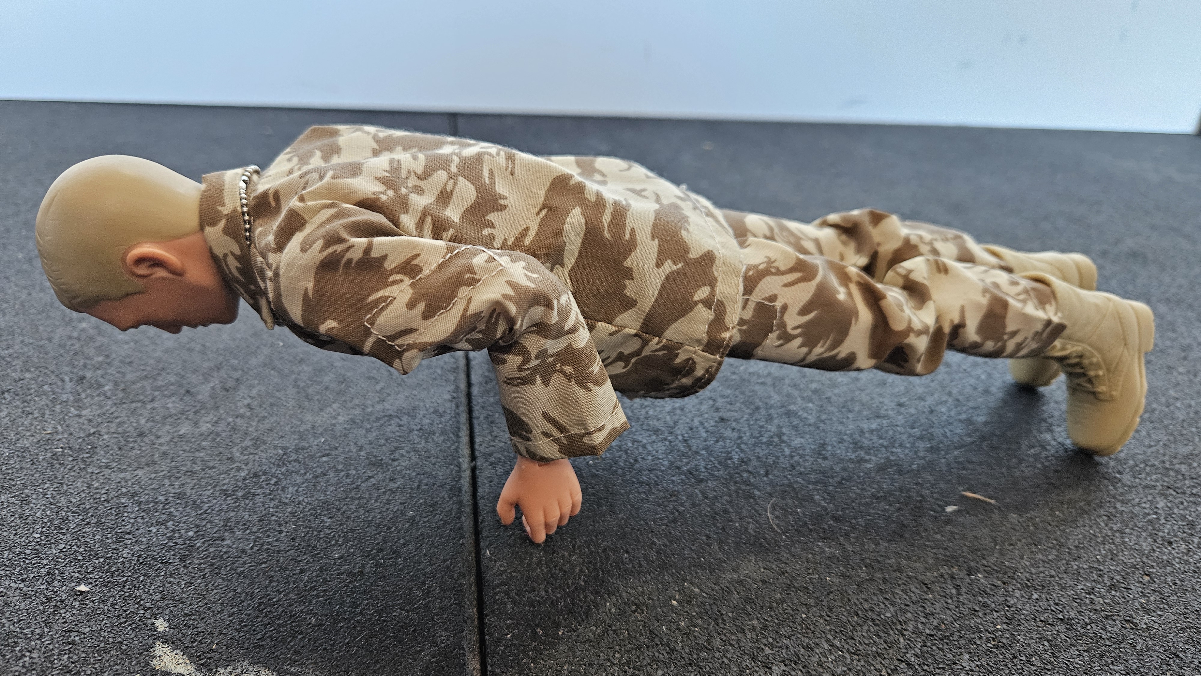 Action Man doing Four Limbed Staff Pose